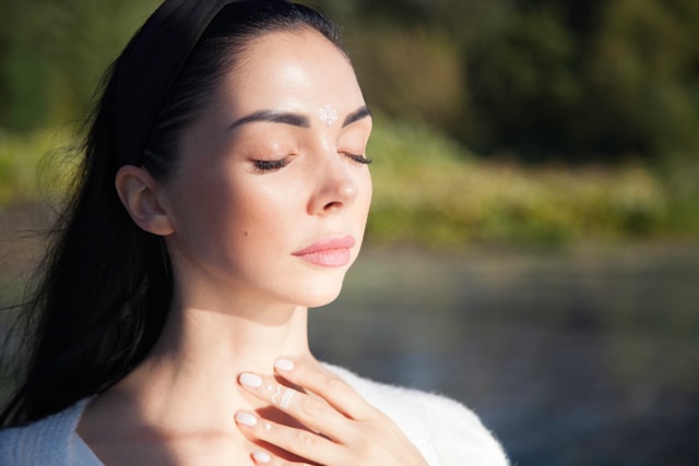 woman practicing vagus nerve reset breathing technique for stress relief