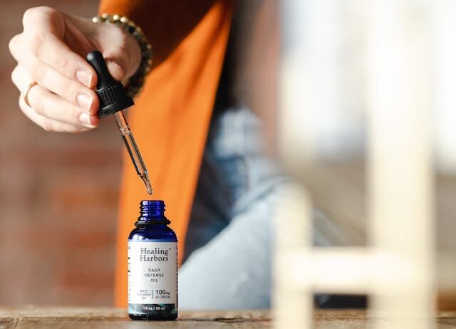 Close-up blue dropper bottle showing methylene blue supplement benefits for longevity