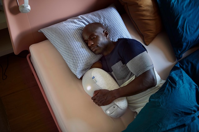 Person sleeping comfortably on their side using the best pillow for side sleepers