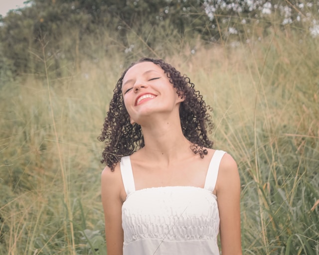 glowing skin woman happy beauty wellness