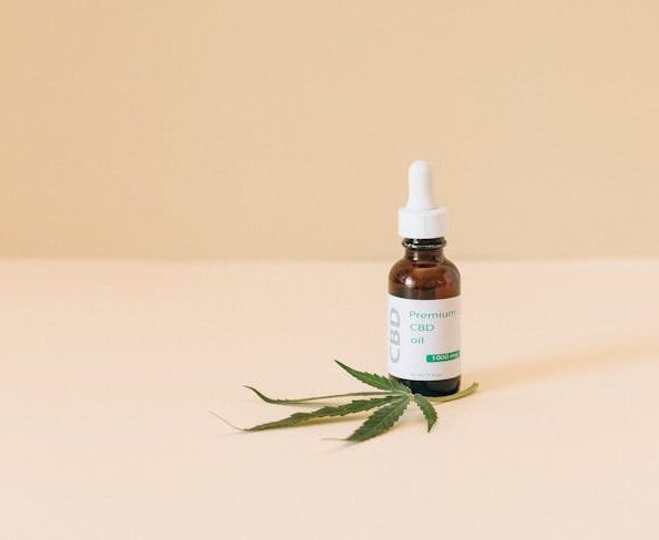 best cbd oil dropper bottles arranged on white surface hemp wellness