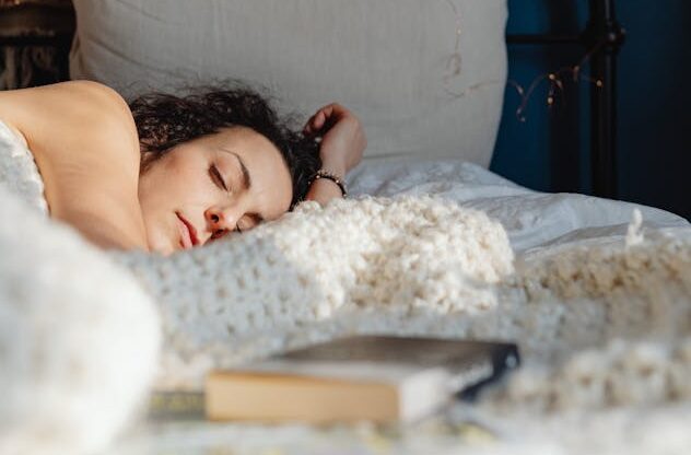 peaceful person sleeping well after using cbd for sleep support