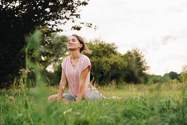 calm woman using cbd oil for anxiety relief and stress reduction