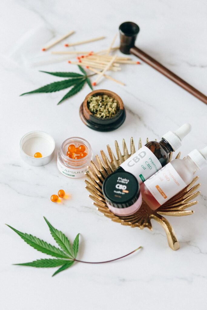 cbn vs cbd oil supplement comparison hemp cannabinol cannabidiol bottles wellness
