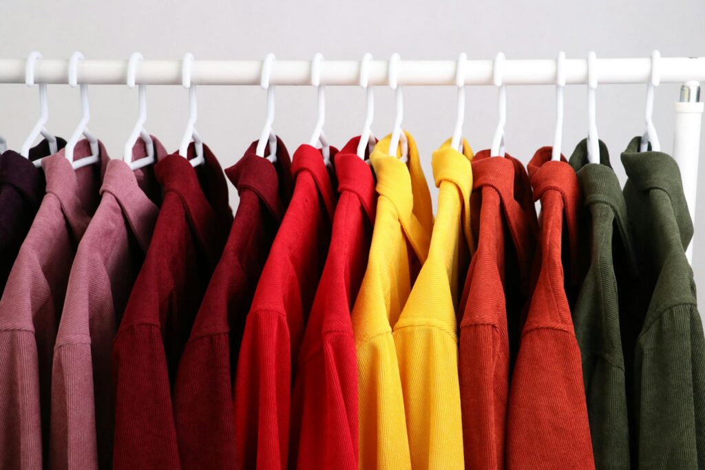colourful dopamine dressing wardrobe bright clothes organised by colour