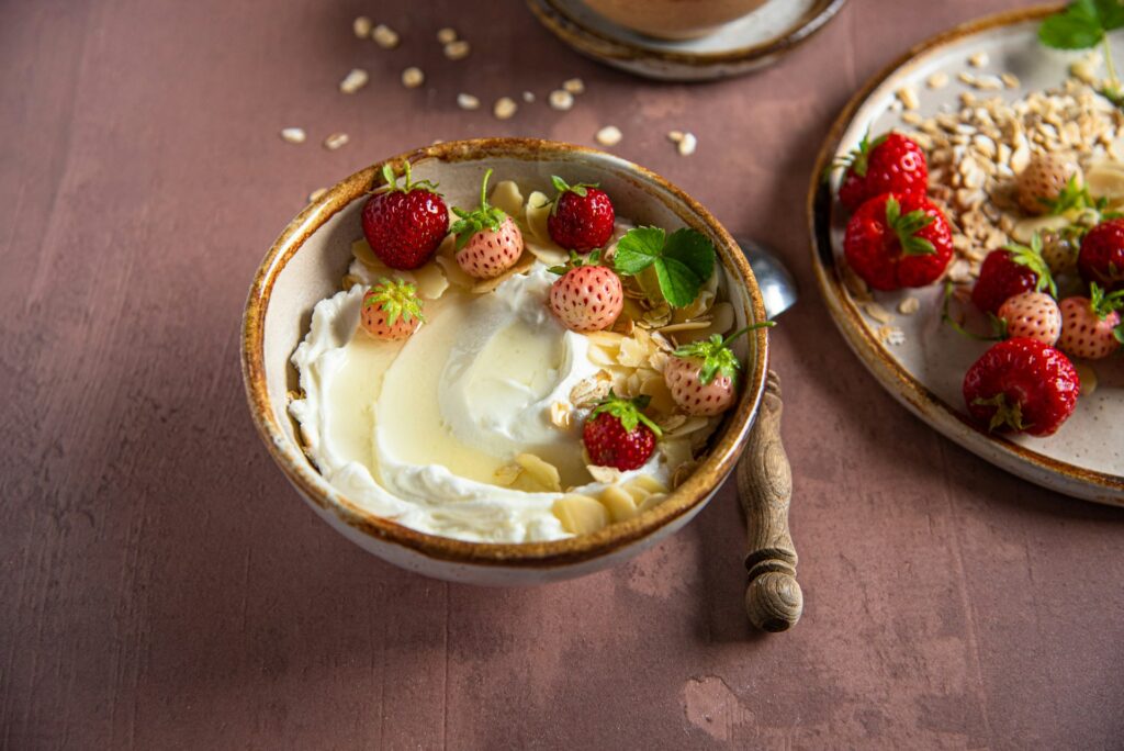greek yogurt benefits bowl with honey berries and nuts healthy breakfast nutrition