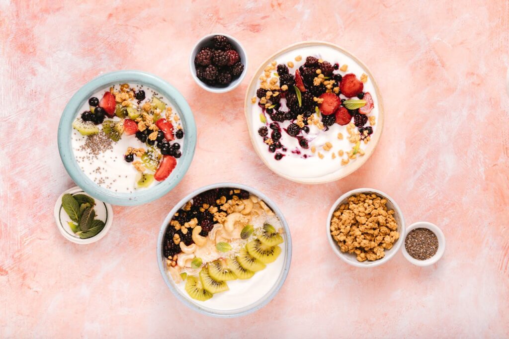 greek yogurt benefits gut health probiotics plain yogurt in bowl with spoon