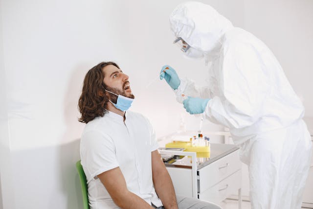man swapping another man's mouth for gut microbiome test