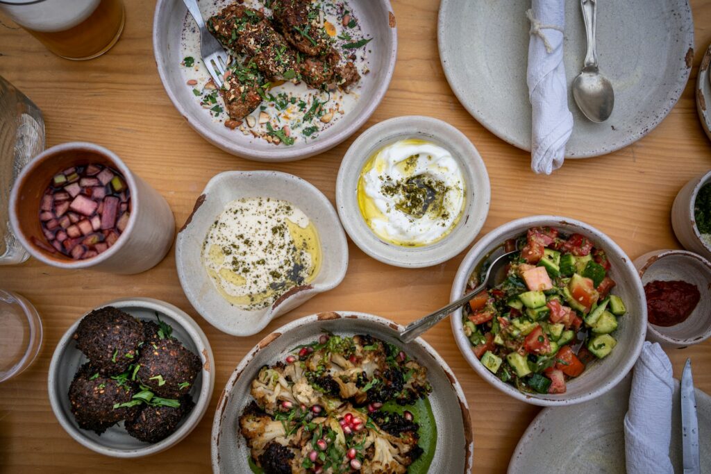 colourful mediterranean diet recipes spread with vegetables olive oil fish and fresh herbs