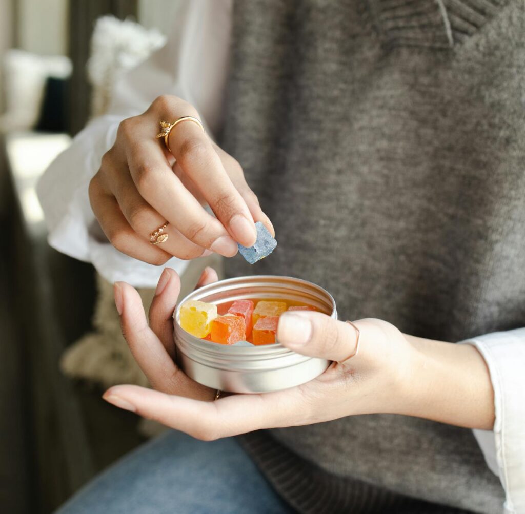 Person holding Wyld CBD gummies for natural wellness and sleep support